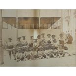 A black and white photograph of a naval gun team from HMS Cesar