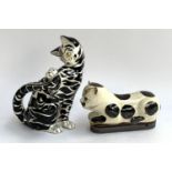 A black and white Italian majolica cat, 26cm high; together with one other, 22cm long