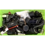 A mixed box of photographic equipment