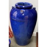 A large blue glazed terracotta urn, 67cmH