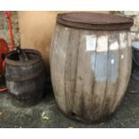 Two oak barrels, the taller approx. 75cmH