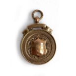 A 9ct gold medal awarded to W. Fossey, 1926, presented by The Bognor Allotment Holders Association