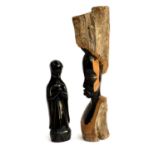 A carved African ebony bust, 51cmH, together with a carved ebony figure of Mary praying, 31.5cmH