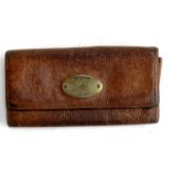 A vintage brown leather Mulberry purse