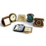 A mixed lot of folding travel clocks to include Westclox Baby Ben; Bulova; Braun; Imhof apparently