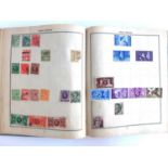 A Triumph stamp album to include stamps from Great Britain, India, Hong Kong, Canada, Belgium,