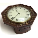 A 19th century mahogany and brass inlaid octagonal wall clock, enamelled dial with Roman numerals