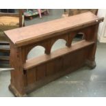 A 19th century pine pew frontal, with heavy oak base, 121cmW