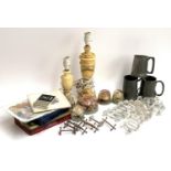 A mixed lot to include resin paperweights; table lamps; silver plated and cut glass knife rests;