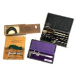 A cased Moore & Wright micrometer; cased drawing instruments; a cased set of Findlay & Co