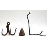 A 19th century lead dressing turnpin, 9cm high; a large iron meat hook; and one other item (3)