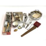 A lot of plated items to include flatware, silver handled button hook etc