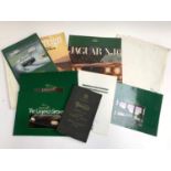 A quantity of Jaguar and Daimler handbooks, brochures and salesman reports, to include XJ series,