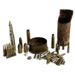 A collection of ammunition shells to include early pre-war tank piercing bullets; Japanese machine