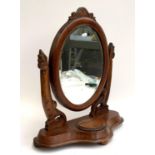 A Victorian oval dressing mirror, 63.5cm high