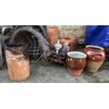A chimney pot, two large glazed stoneware jars, fire grate, brass stair rods etc