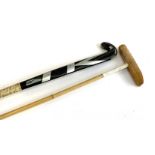 A T. P Argentina polo stick, 52, together with a hockey stick, 36in