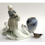 A Royal Copenhagen vase, Swan and bird figurine; together with a Lladro figurine of a girl holding a