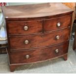 A 19th century mahogany bowfront chest of two short over two long drawers, on later bracket feet,