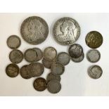 A quantity of Victorian silver coins to include a four pence coin, 1854, half crown 1895, 1900,