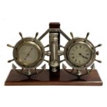 A Cooke & Kelvey London & Calcutta barometer, thermometer, and clock, in the form of two ship's