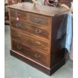 An early 20th century chest of two short over thee long drawers, mahogany with barbers pole