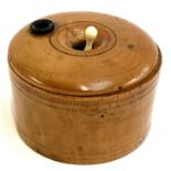 A 19th century treen roulette wheel box and cover, inscribed and dated 1934, 5.5cmH
