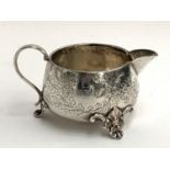 An Edwardian silver cream jug by Stokes & Ireland Ltd, Chester 1904, 3.3ozt