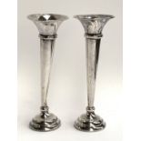 A pair of loaded silver spill vases, J & R Griffin (Joseph & Richard Griffin), Chester 1923, 18cm