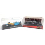An SCX McLaren F1 car, boxed, together with a Scalextric Renault F1 car, boxed