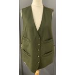 A green wool waistcoat with buckle fastening to rear