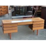A mid century sideboard/dressing table, with adjustable rectangular mirror, over an arrangement of