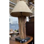 A table lamp in the form of a bundle of driftwood, 67cmH to top of shade