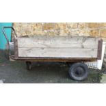 A useful garden trailer with plank sides and plywood base, 76x135cm