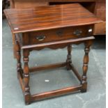 An 18th century style stained hardwood side table of recent manufacture, single drawer over baluster
