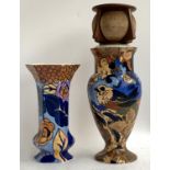A Charlotte Rhead Bursley ware hexagonal vase with tube lined floral peony design, 20cmH, together