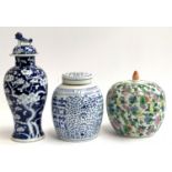 A Chinese famille rose ginger jar, 26cmH; together with two further blue and white Chinese lidded