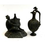 A bronze ewer with stylised dragon handle, 15cmH; together with a lidded pot in the form of a