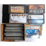 A large quantity of Royal Mail presentation packs and first day covers in 2 albums and a box, to