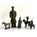 A stoneware figure of a Samurai, 33cmH, together with one smaller kneeling, 17.5cmH, a similar horse