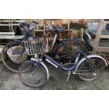 A vintage Humber bike together with a 'The Universal' vintage folding bike