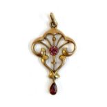 A 9ct gold and pink tourmaline Art Nouveau style lavelier pendant, 3.4cm long, approx. 1g