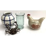 A cast iron egg holder, together with a ceramic chicken tureen, and 2 vases