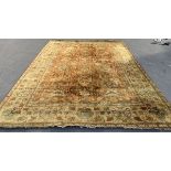 A very large yellow wool rug, some moth, 490x340cm