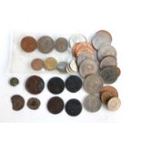 A small quantity of coins to include a Tudor coin from the 1560s, late 18th/early 19th century