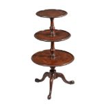 A George III mahogany three tier dumb waiter, circa 1780, 104cm high, 39cm diameter