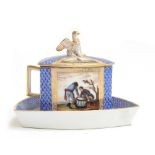 A 19th century Dresden porcelain three sided cup and cover, the lid with eagle finial (wing af),