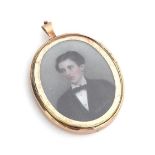 A 19th century gold locket containing a portrait miniature on ivory of a young man, signed 'K.