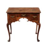 A walnut and crossbanded side table, early 18th century and later, 70cm high, 75cm wide, 51cm deep