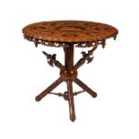 A Swiss walnut, burr walnut, and inlaid centre table, second half 19th century, the shaped top